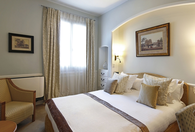 Imagen de la habitación del Hotel Le Pigonnet. Foto 6