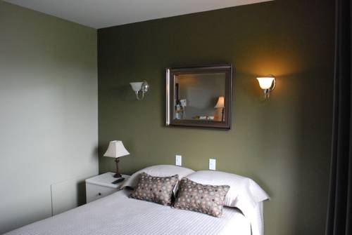 Imagen de la habitación del Hotel Le Pionnier. Foto 4