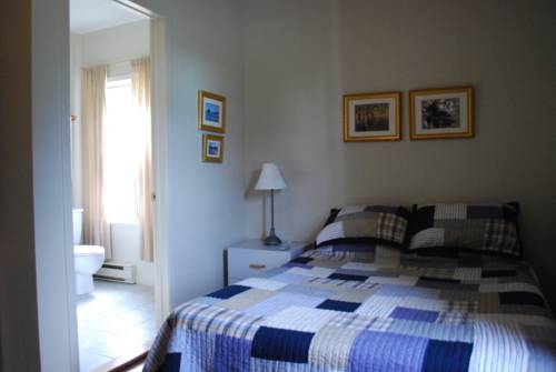 Imagen de la habitación del Hotel Le Pionnier. Foto 8