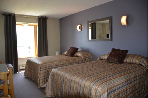 Imagen de la habitación del Hotel Le Pionnier. Foto 9