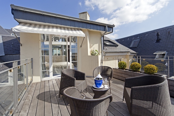 Imagen de la habitación del Hotel Le Place D Armes. Foto 2