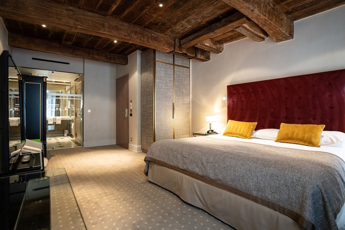 Imagen de la habitación del Hotel Le Place D Armes. Foto 9