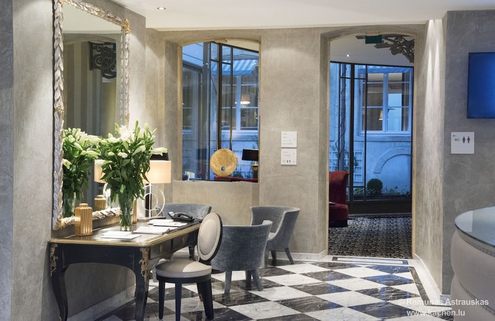 Imagen de los interiores del Hotel Le Place D Armes. Foto 18