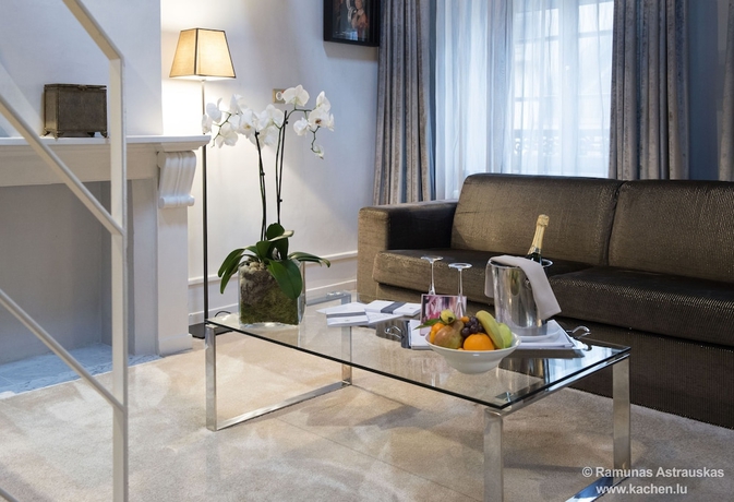 Imagen de la habitación del Hotel Le Place D Armes. Foto 12