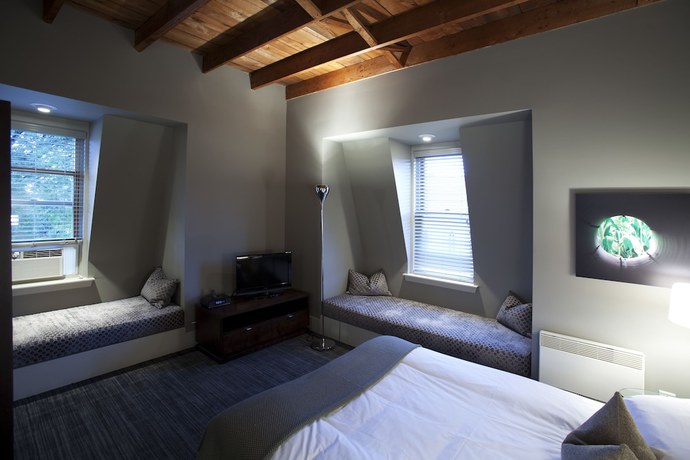 Imagen de la habitación del Hotel Le Pleasant H&ocirc;tel. Foto 16