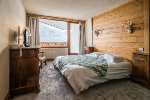 Imagen de la habitación del Hotel Le Portillo. Foto 16