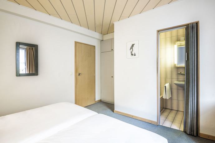Imagen de la habitación del Hotel Le Postillon. Foto 12
