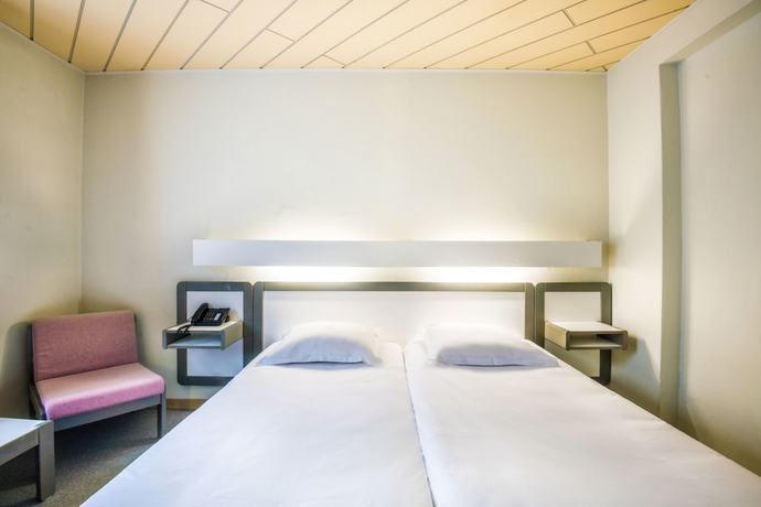 Imagen de la habitación del Hotel Le Postillon. Foto 16