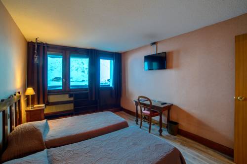 Imagen de la habitación del Hotel Le Pourteilh. Foto 3