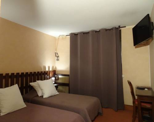 Imagen de la habitación del Hotel Le Pourteilh. Foto 5