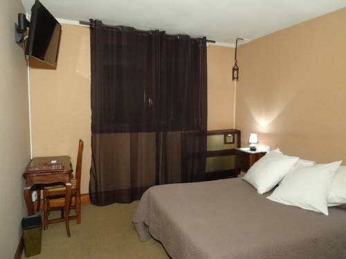 Imagen de la habitación del Hotel Le Pourteilh. Foto 6