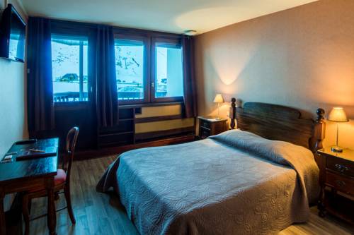 Imagen de la habitación del Hotel Le Pourteilh. Foto 13