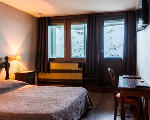 Imagen de la habitación del Hotel Le Pourteilh. Foto 15