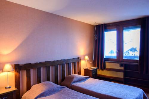 Imagen de la habitación del Hotel Le Pourteilh. Foto 16