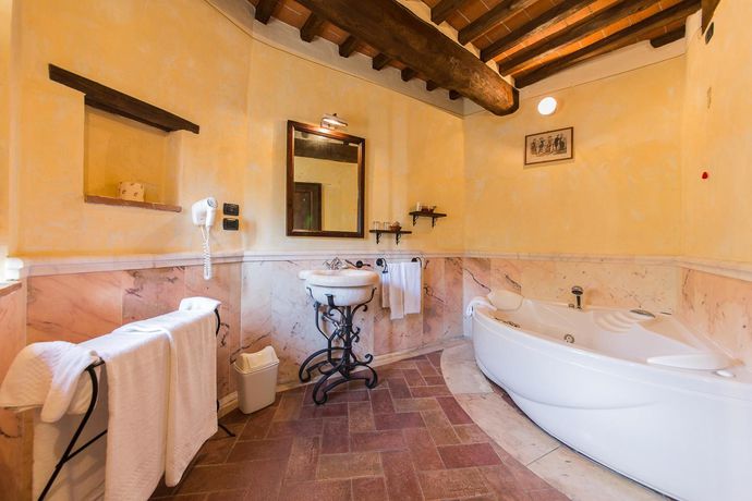 Imagen de la habitación del Hotel Le Pozze Di Lecchi. Foto 6
