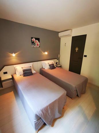 Imagen de la habitación del Hotel Le Pradet. Foto 14