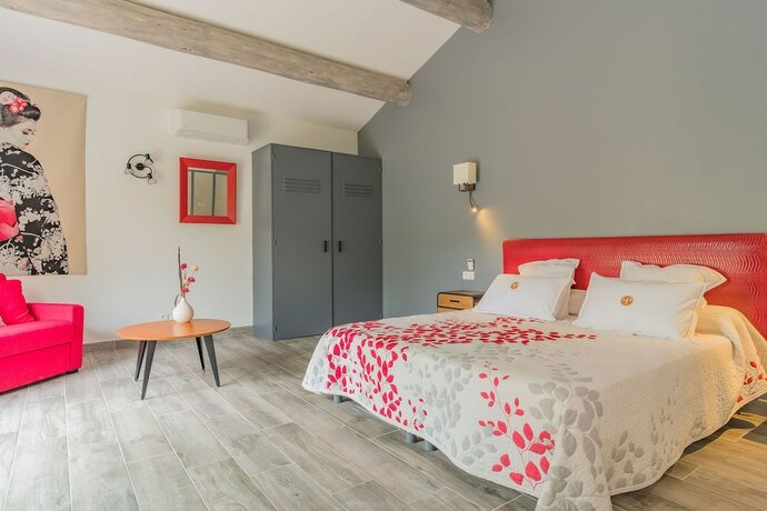 Imagen de la habitación del Hotel Le Pradinas. Foto 17