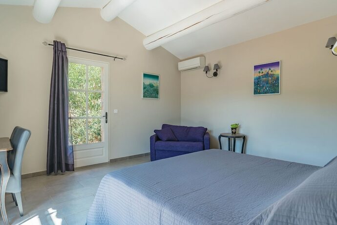 Imagen de la habitación del Hotel Le Pradinas. Foto 18