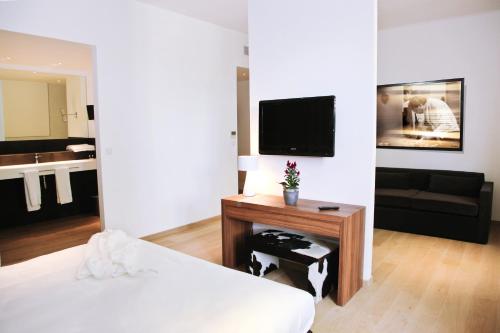 Imagen de la habitación del Hotel Le Pré Du Moulin. Foto 8