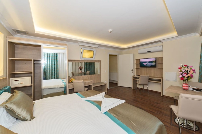 Imagen de la habitación del Hotel Le Premier House. Foto 3