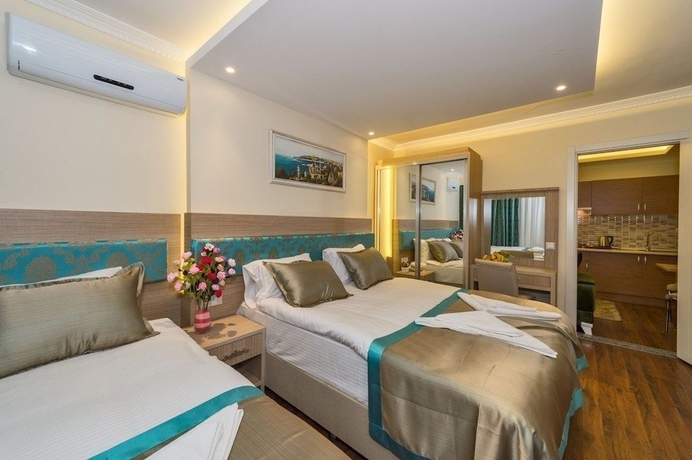 Imagen de la habitación del Hotel Le Premier House. Foto 4