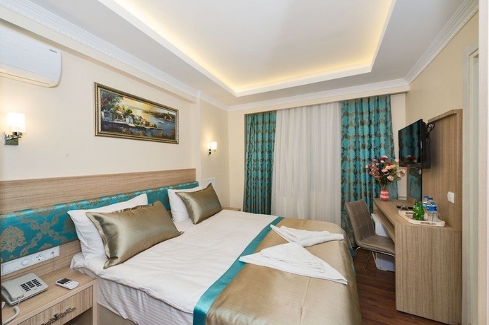 Imagen de la habitación del Hotel Le Premier House. Foto 6