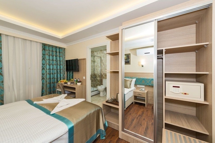 Imagen de la habitación del Hotel Le Premier House. Foto 7