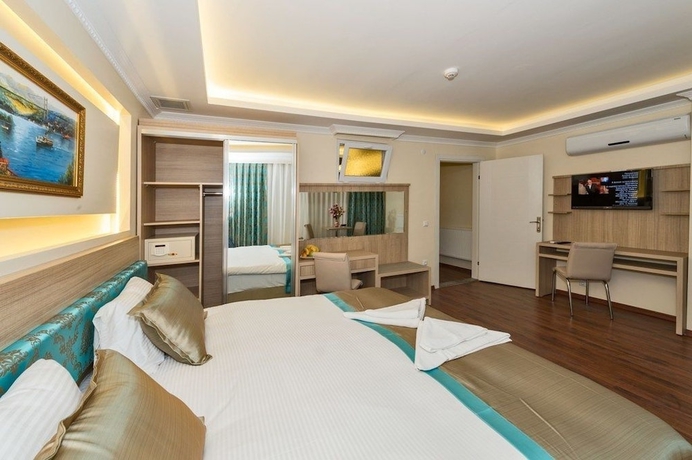 Imagen de la habitación del Hotel Le Premier House. Foto 10