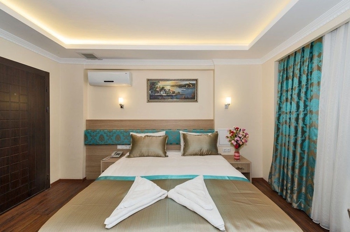 Imagen de la habitación del Hotel Le Premier House. Foto 14