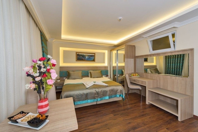 Imagen de la habitación del Hotel Le Premier House. Foto 15