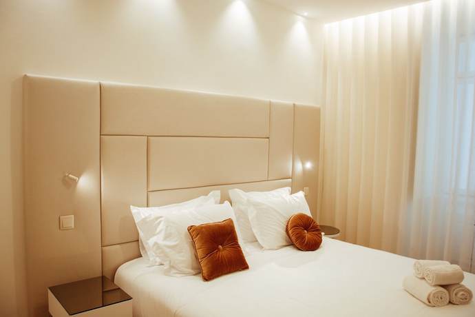 Imagen de la habitación del Hotel Le Premier Lisbon Suites. Foto 3