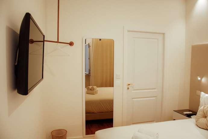 Imagen de la habitación del Hotel Le Premier Lisbon Suites. Foto 4