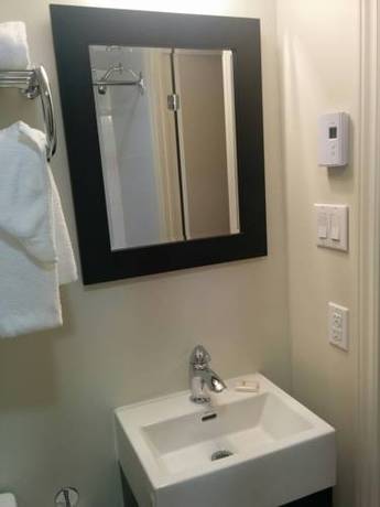 Imagen de la habitación del Hotel Le Principal. Foto 5