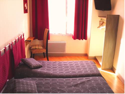 Imagen de la habitación del Hotel Le P'tit Monde. Foto 6