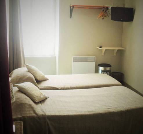 Imagen de la habitación del Hotel Le P'tit Monde. Foto 9