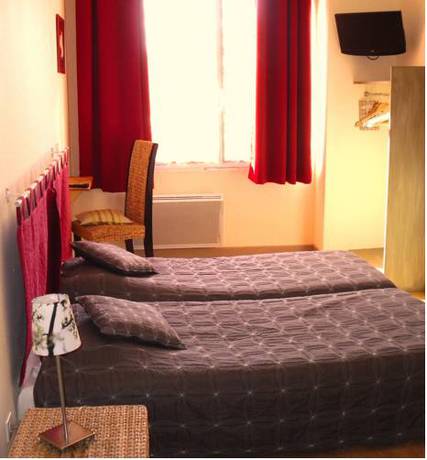 Imagen de la habitación del Hotel Le P'tit Monde. Foto 11