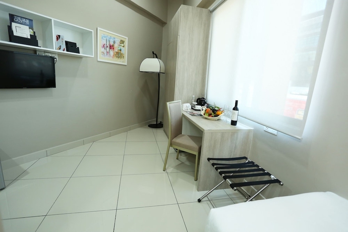 Imagen de la habitación del Hotel Le Quadri. Foto 11