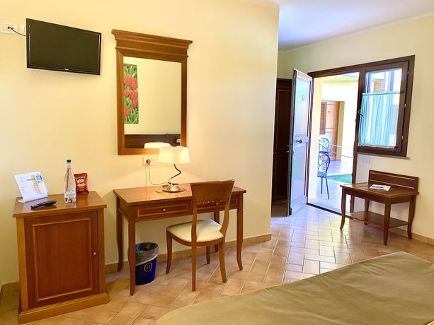 Imagen de la habitación del Hotel Le Querciolaie dei Ricci. Foto 12