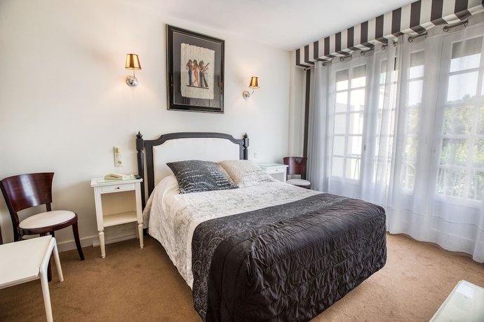 Imagen de la habitación del Hotel Le Quercy. Foto 8