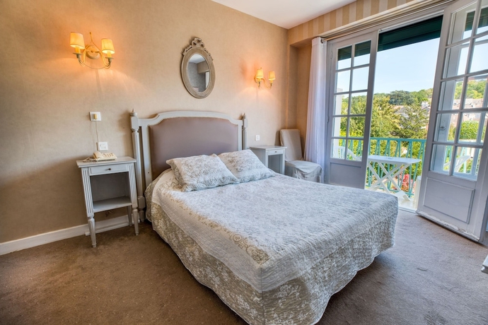 Imagen de la habitación del Hotel Le Quercy. Foto 10