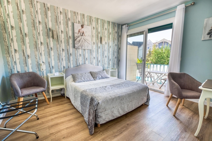 Imagen de la habitación del Hotel Le Quercy. Foto 11