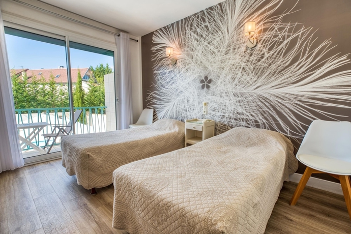 Imagen de la habitación del Hotel Le Quercy. Foto 12