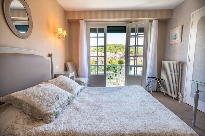 Imagen de la habitación del Hotel Le Quercy. Foto 14