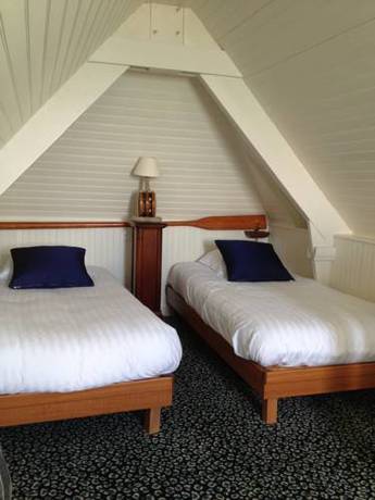 Imagen de la habitación del Hotel Le Querrien. Foto 5