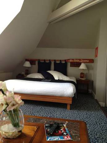 Imagen de la habitación del Hotel Le Querrien. Foto 11