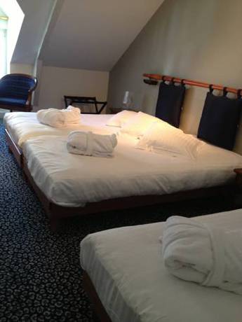 Imagen de la habitación del Hotel Le Querrien. Foto 12