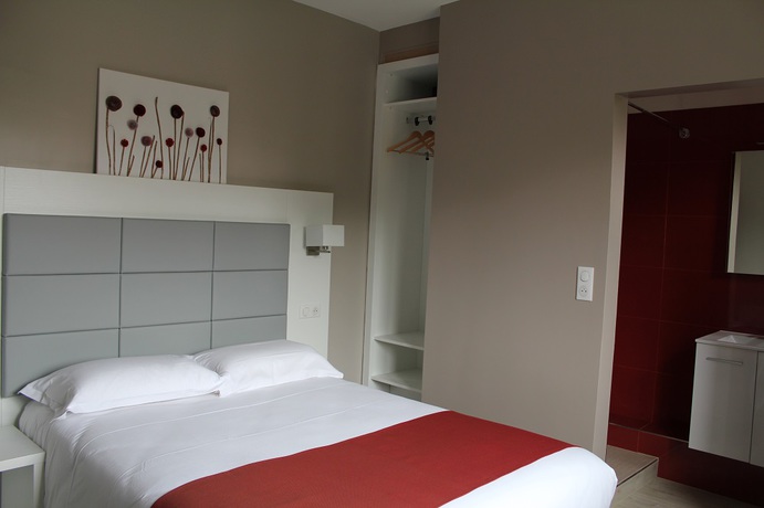 Imagen de la habitación del Hotel Le Quincangrogne. Foto 4