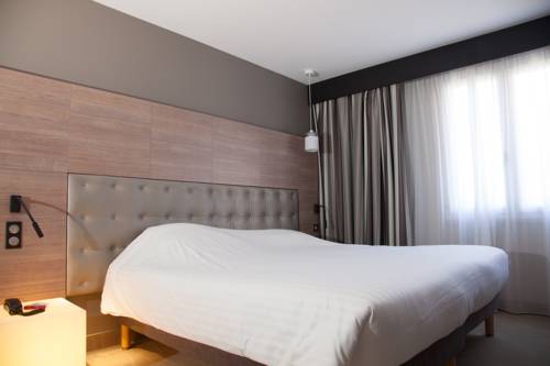 Imagen de la habitación del Hotel Le Rabelais. Foto 10