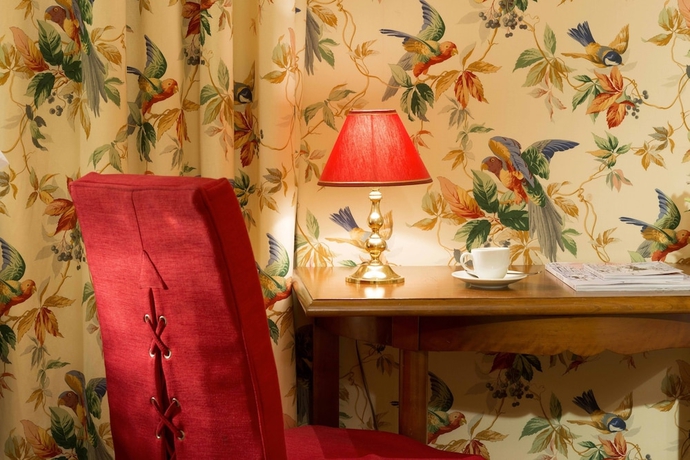 Imagen de la habitación del Hotel Le Regent, París. Foto 3