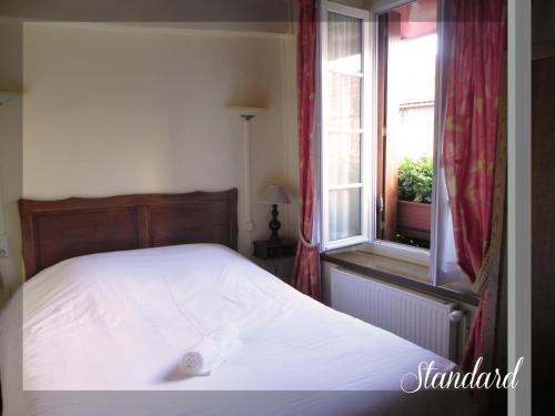 Imagen de la habitación del Hotel Le Relais Champenois Logis. Foto 5